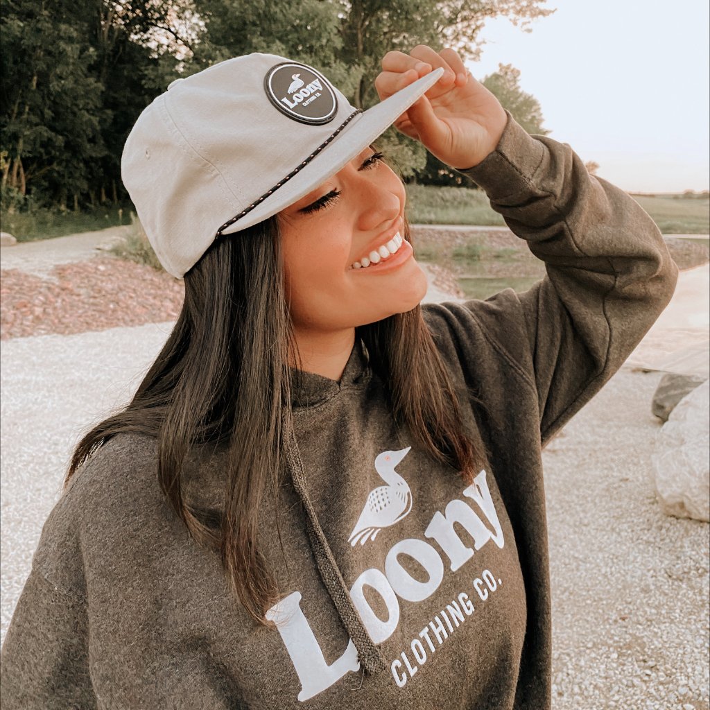 model wearing loony camp hat